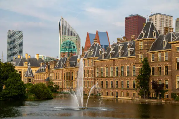 Photo of The Hague (Den Haag) city centre, Panorama of the Binnenhof at the Hofvijver lake in The Hague, the government complex houses the Senate (Eerste Kamer) and the House of Representatives (Tweede Kamer), and the office of the Prime Minister of the Netherland