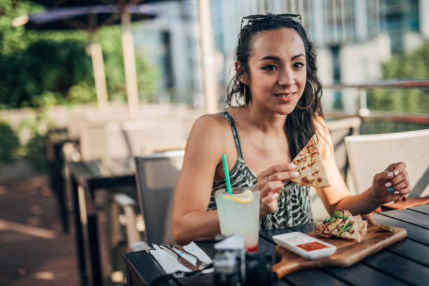 istock Woman in restaurant 1182490062