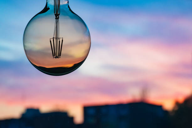 istock Sunset or sunrise in a light bulb 1182490483
