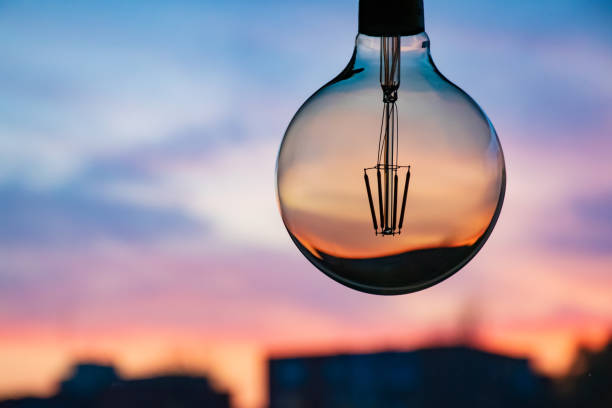 istock Sunset or sunrise in a light bulb 1182490486