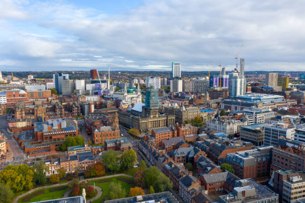 Aerial photo of the Leeds town centre in the UK showing the Leeds Town Hall with construction work being done on the tower stock photo