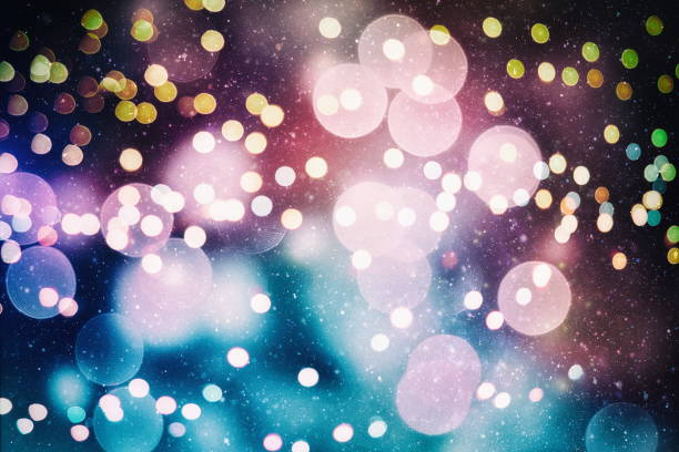 istock abstract background of blurred yellow lights with bokeh effect, new year 1182491536