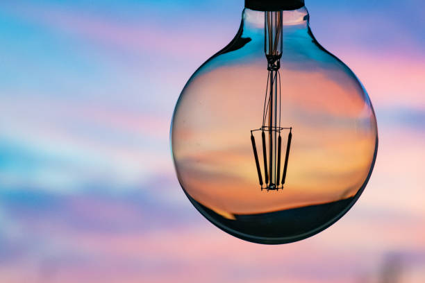 istock Sunset or sunrise in a light bulb 1182491825
