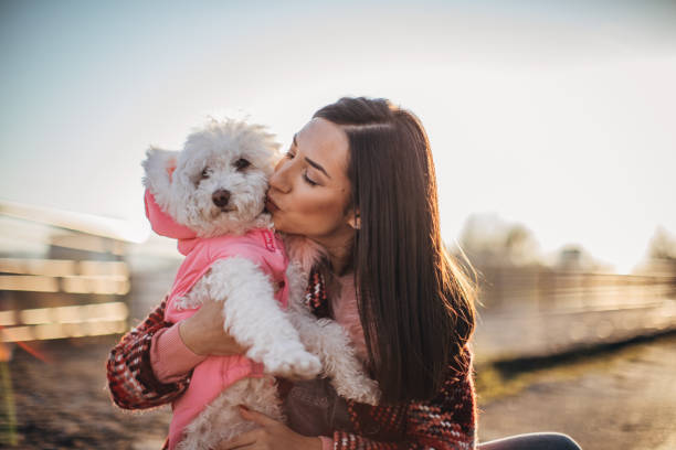 istock Woman and her cute dog 1182495437