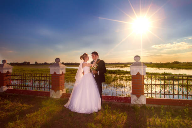 istock Bride and groom on a wedding walk. 1182495502