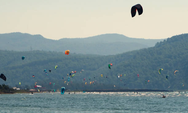 istock Akyaka town beach and moored ships in port 1182496409