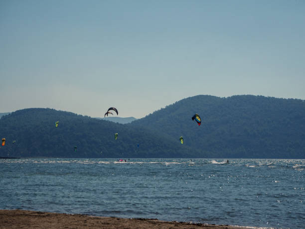 istock Akyaka town beach and moored ships in port 1182497149