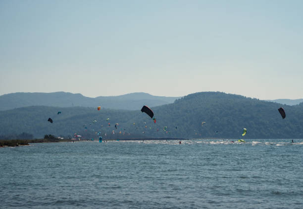 istock Akyaka town beach and moored ships in port 1182497197