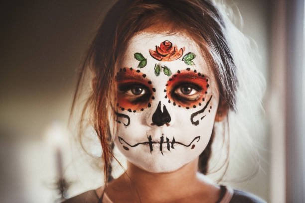 Little girl portrait with makeup skeleton 6 years old little girl with a skeleton face painted, Quebec, Canada halloween face paint stock pictures, royalty-free photos & images
