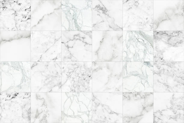 istock White grey square marble tiles texture background. Grey marble wall. 1182508723