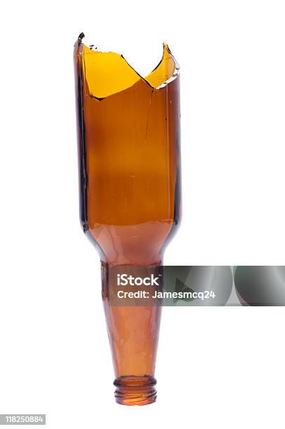 Broken Beer Bottle Turned Upside Down Over White Background Stock Photo - Download Image Now