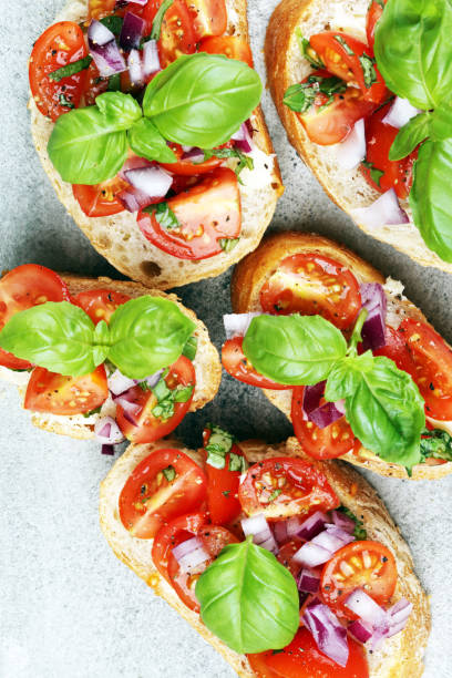 istock fresh tomato bruschetta. italian food appetizer with basil on table 1182509931