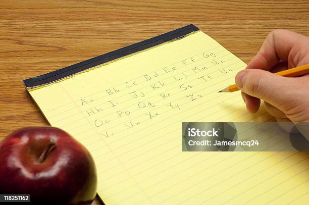 Writing The Alphabet Stock Photo - Download Image Now - Color Image, Desk, Education