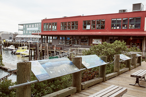 Portland, Maine - September 26th, 2019: Informational signs overlooking harbor in the Old Port Harbor district of Portland, Maine.