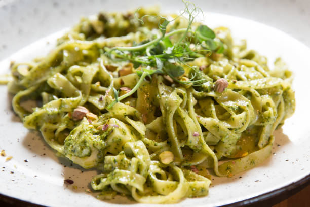 istock Tagliatelle pasta with pistachio and sauce pesto 1182515342