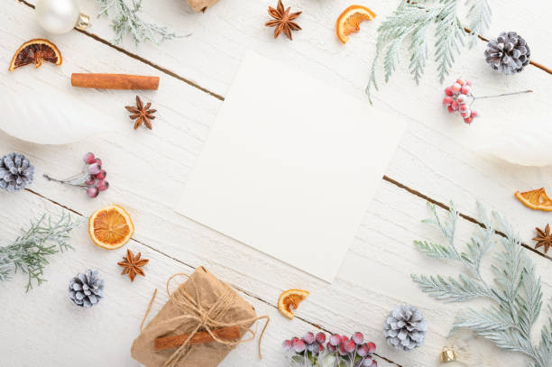 istock frame, Christmas, New Year. Background with composition, with empty postcard space for design. On a white wooden background. 1182515426
