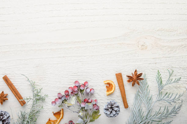 istock New Year composition or Christmas on a white wooden background 1182515578