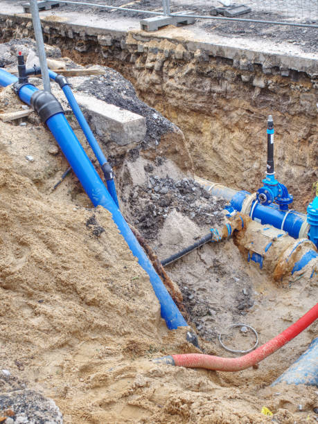 istock Building of underground shaft for setting valve on water pipe 1182518071