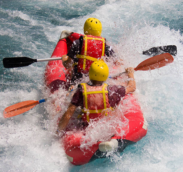 istock Two People In Protective Sportswear On Rafting Boat In River 118252180