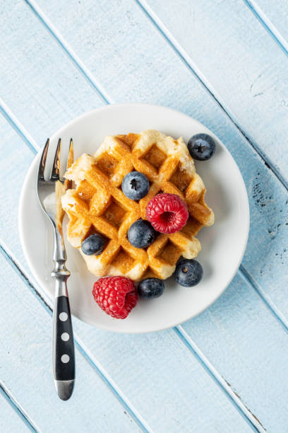 istock Waffles with blueberries and raspberries. 1182523904