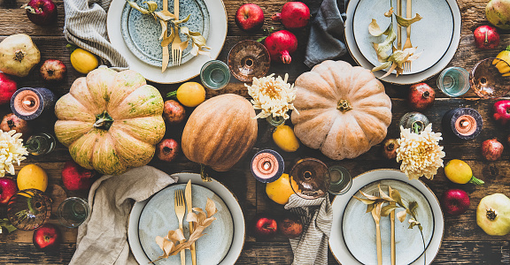Table setting for Thanksgiving day or family dinner, wide composition