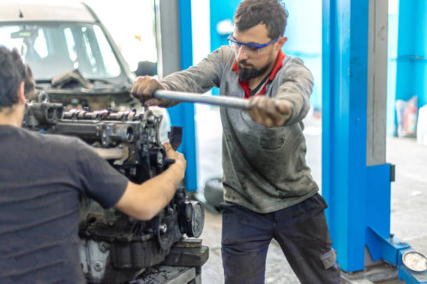 istock Repairmen in car service 1182526557