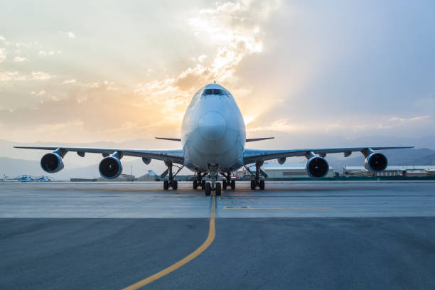 istock Airplane On Airport at sunset 1182528633