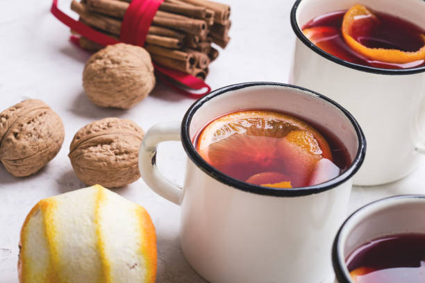 Hot drinks mulled wine, fresh orange fruits