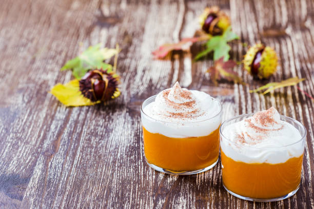 istock Autumn dessert, pumpkin mousse with whipped cream 1182528853