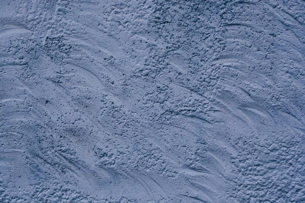 istock Color painted concrete wall with abstract background texture 1182529021