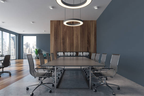 istock Gray and wooden conference room interior 1182531538