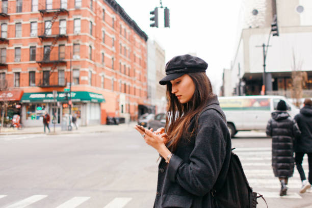 istock searching for a ride share in Manhattan, NYC 1182532355
