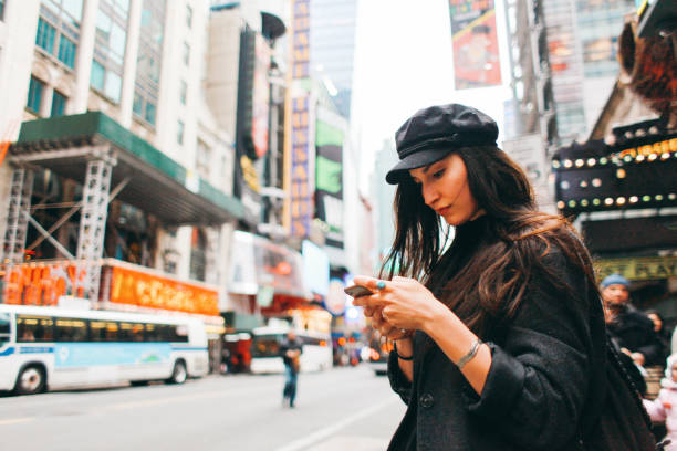 istock searching for a ride share in Manhattan, NYC 1182532984