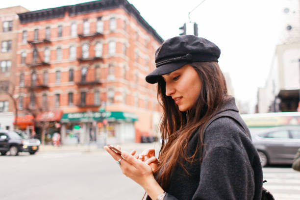 istock searching for a ride share in Manhattan, NYC 1182534025