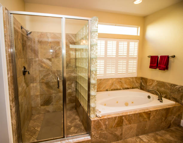 istock Bathroom Tub And Shower With Bottle Glass 1182536699