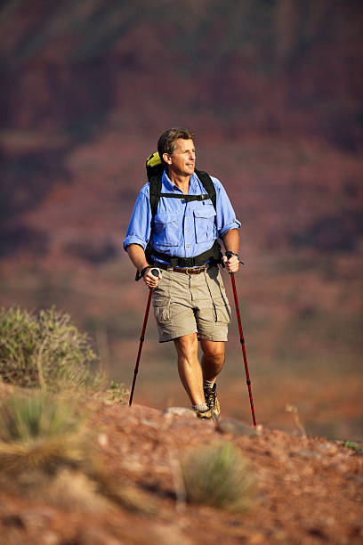 istock Male Backpacking Through The Desert In Moab 118253883