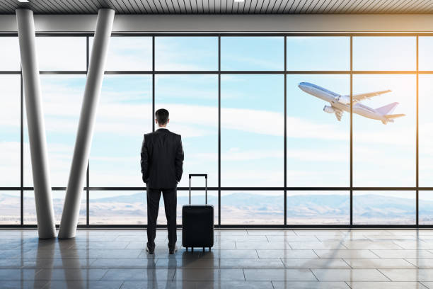 istock Businessman in airport 1182538911