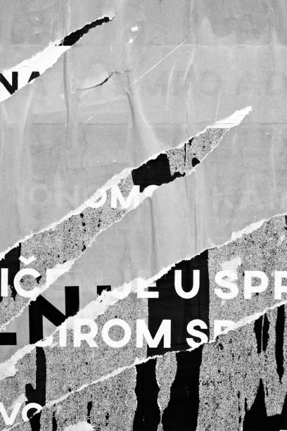 istock Blank white black old ripped torn paper crumpled creased posters grunge textures backdrop backgrounds placard 1182540248