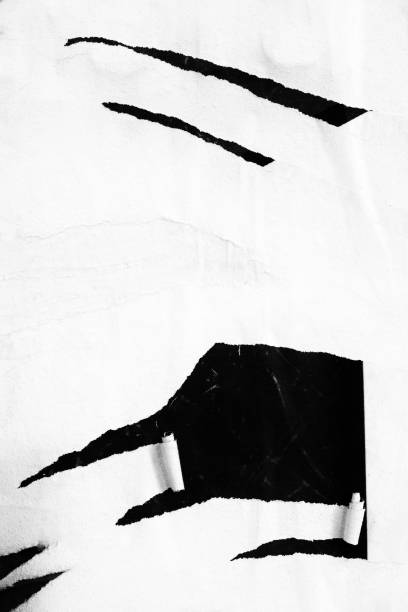 istock Blank white black old ripped torn paper crumpled creased posters grunge textures backdrop backgrounds placard 1182540957
