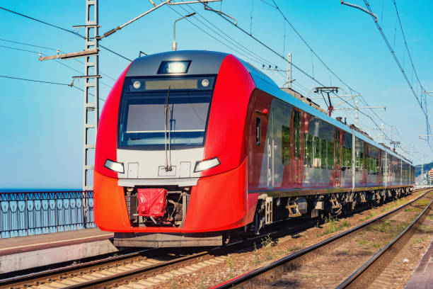 istock Passenger train stands along the platform by the Black sea coast. Sochi. 1182542851