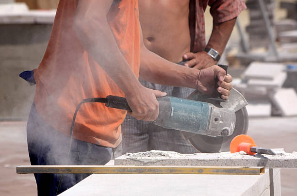 istock man working with electric saw 118254297