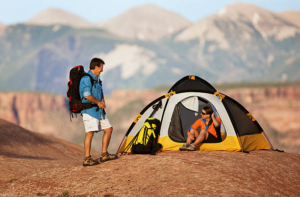 istock Couple In Campground With Tent And Backpacks 118254661