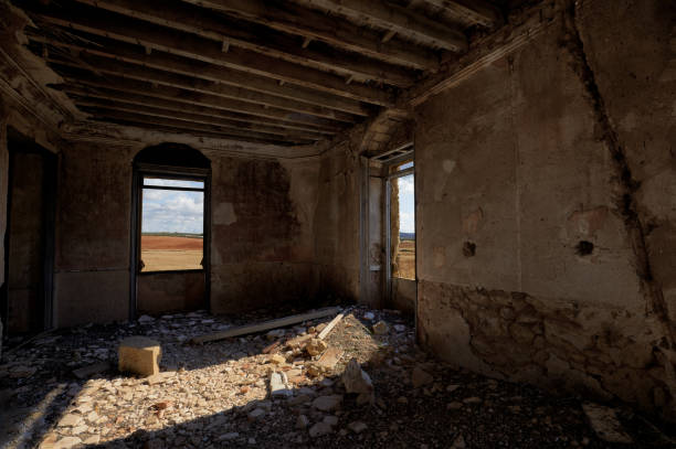 istock Light entrances in an abandoned and ruined room 1182547305