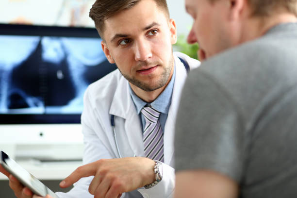 istock Doctor talking to patient 1182549541