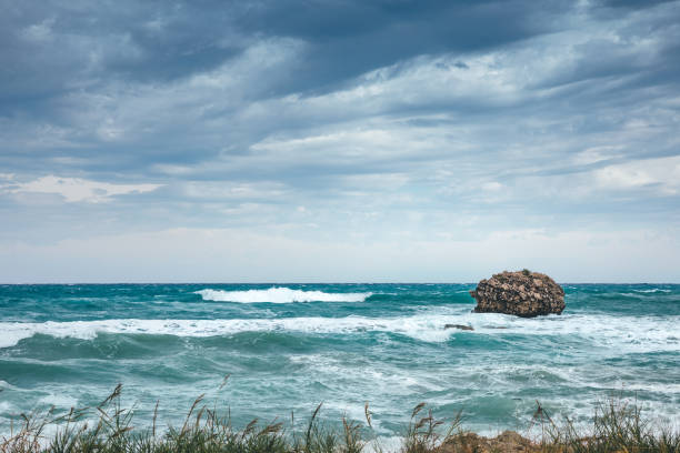 Stormy day on a wild Kefalonian beach (Limenia beach, Kefalonia island, Greece).
