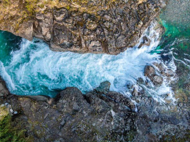 Aerial view of Caunahue river in southern Chile Aerial view of Caunahue river located near to Ranco Lake in southern Chile rapids river stock pictures, royalty-free photos & images