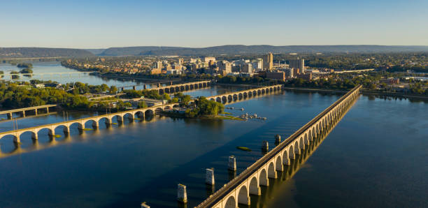 Harrisburg state capital of Pennsylvania along on the Susquehanna River Morning light hits the buildings and bridges downtown city center area in Pennsylvania state capital at Harrisburg harrisburg pennsylvania stock pictures, royalty-free photos & images