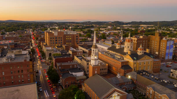 Aerial Perspective Over Downtown City Center York Pennsylvania at Sunset Traffic is backed up at the stop lights on main streets in York PA USA pennsylvania stock pictures, royalty-free photos & images