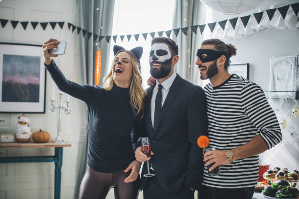 istock Halloween party selfie 1182553189