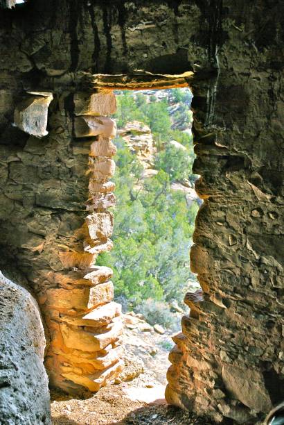 istock looking out from Pre-Puebloan cliff dwelling 1182557870